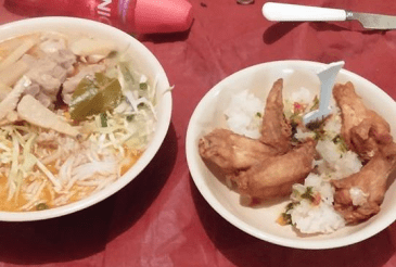 Some khao poon and sticky rice with chicken and Thai green chili lime sauce